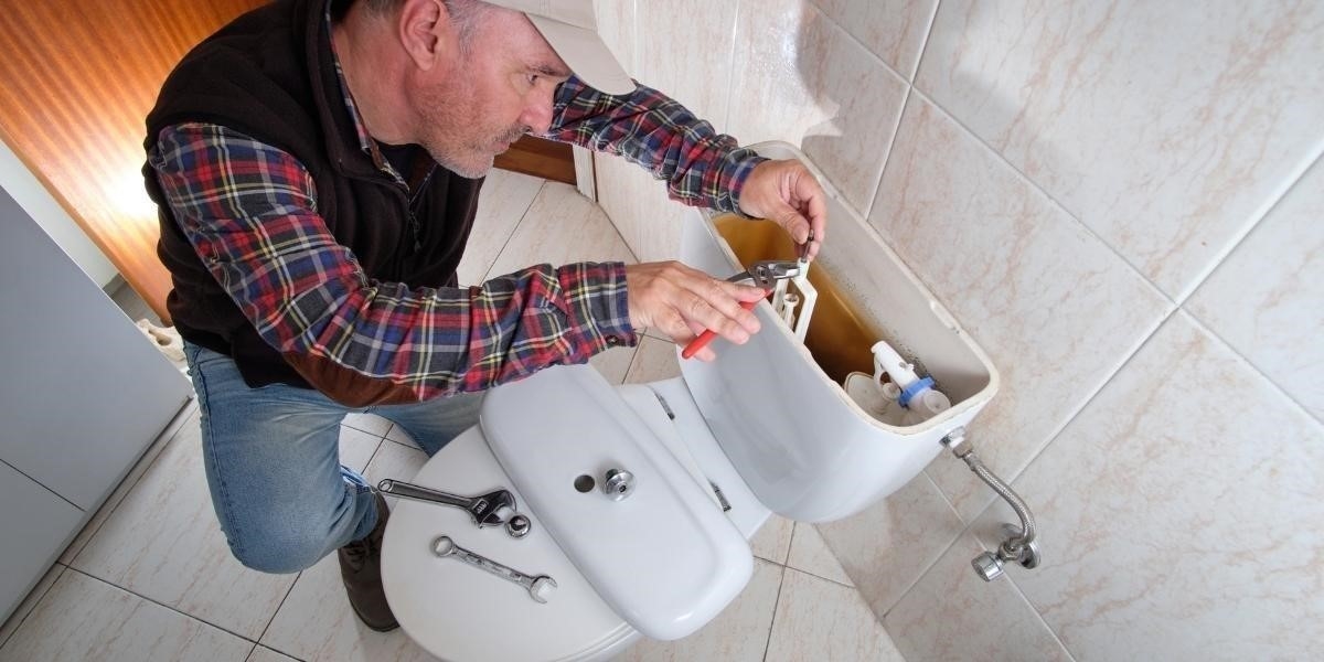 Réparation fuite vis fixation réservoir WC - étapes essentielles